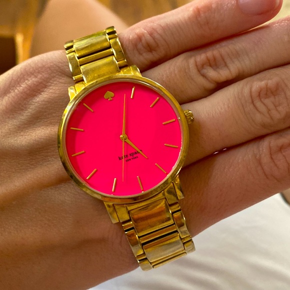Kate Spade water resistant stainless steel hot pink watch.